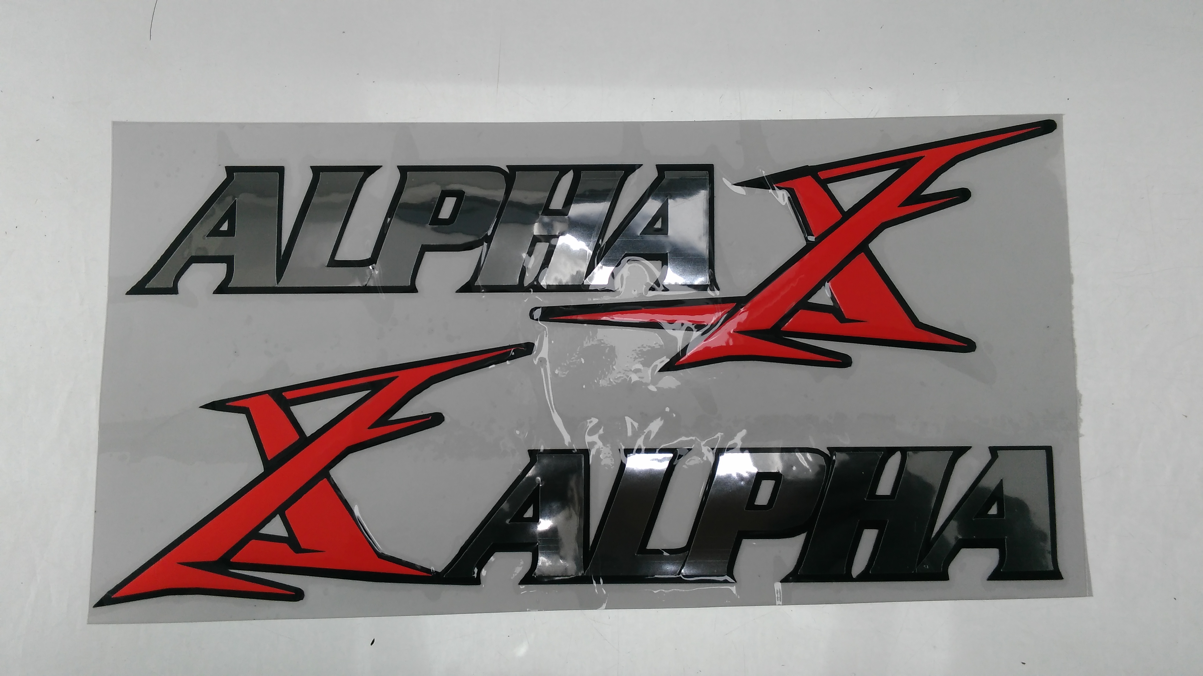 Наклейки бака Alpha PLT