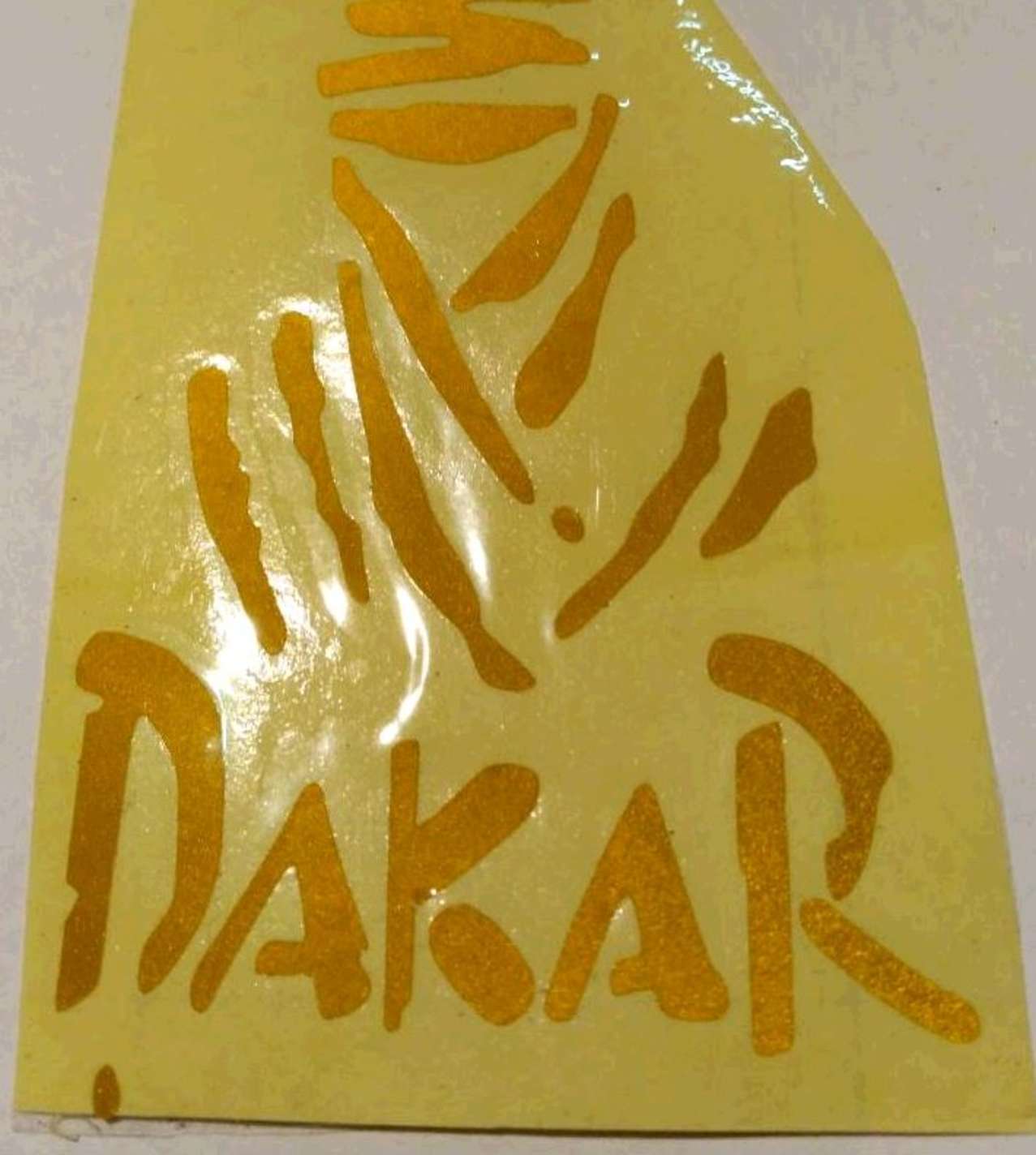 Наклейка логотип DAKAR (7x10см, желтая, светоотражающая)