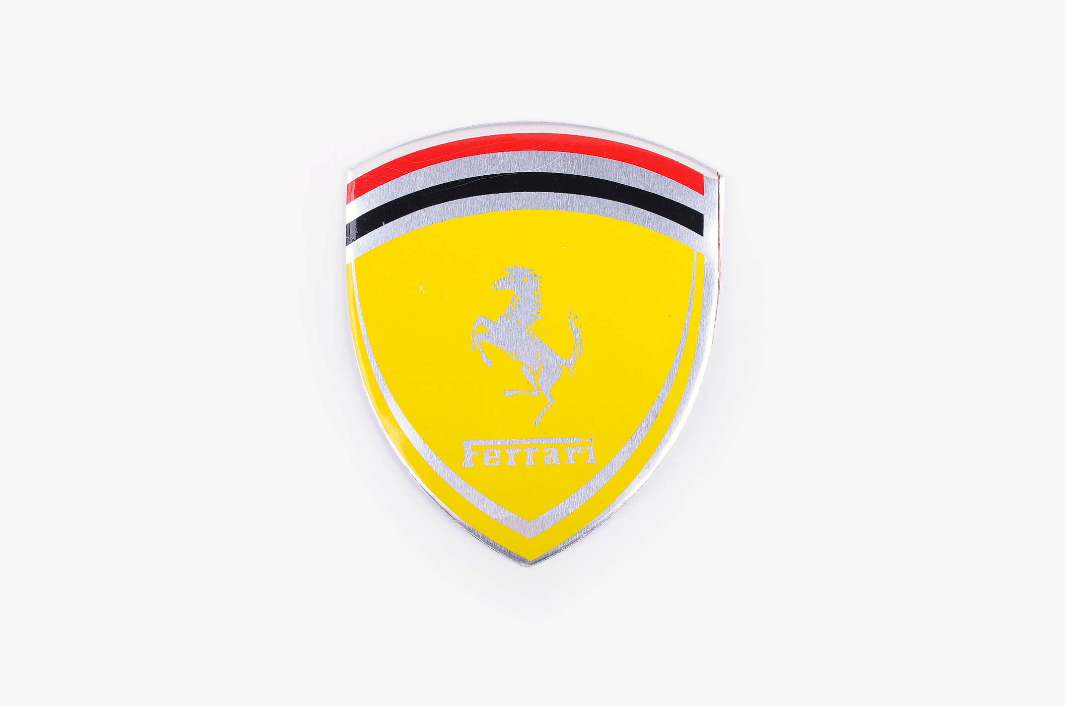 Наклейка логотип FERRARI (8x9см, алюминий) (#4601)