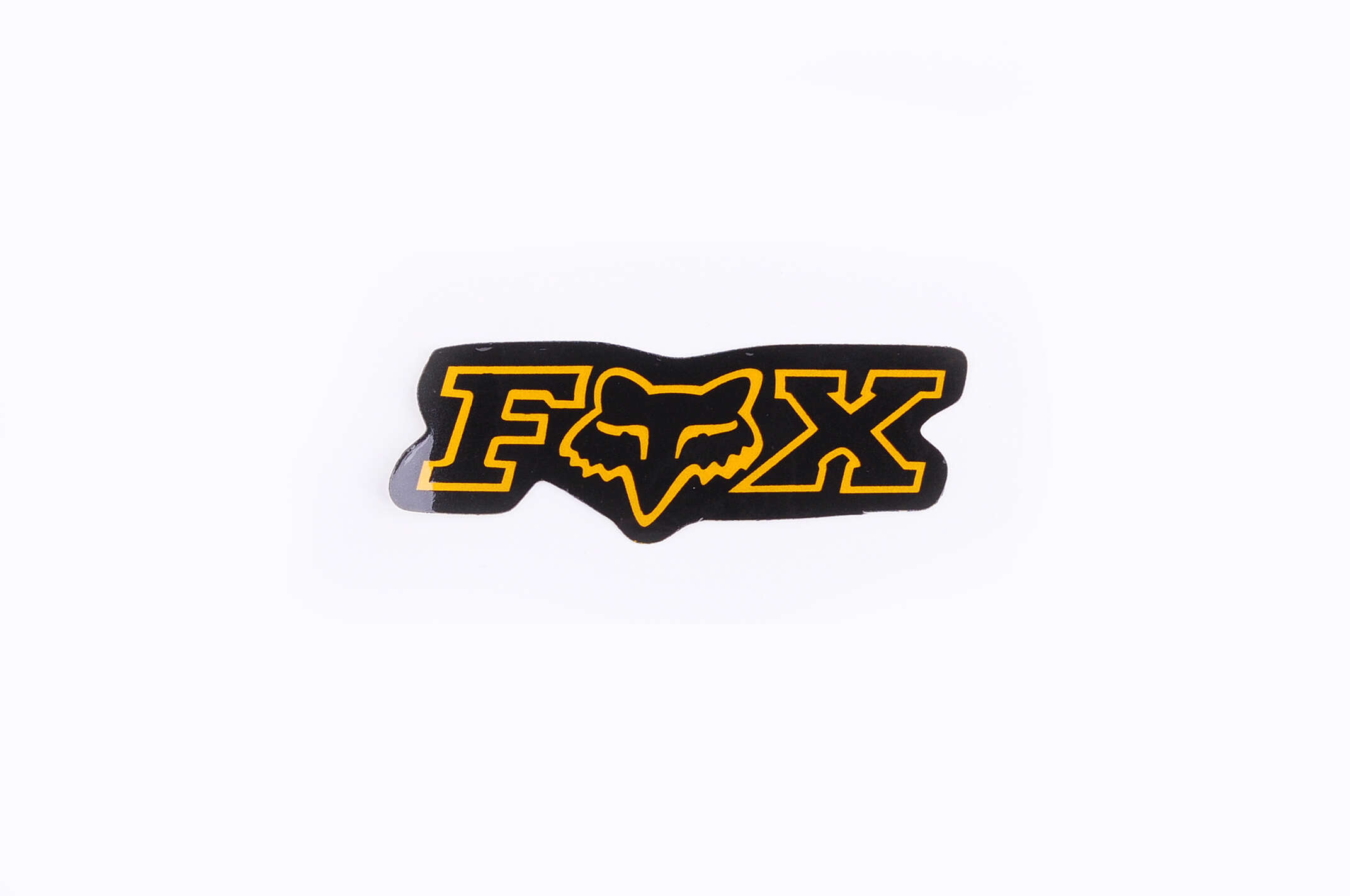 Наклейка логотип FOX (7x1см, 20шт, черный) (#4907)