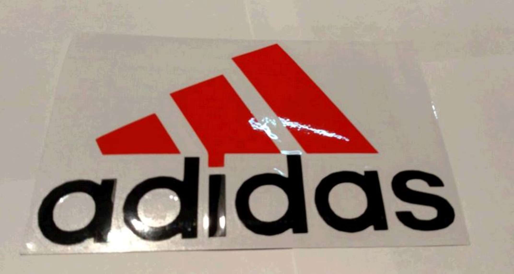 Наклейка логотип ADIDAS (14x9см, красно-черная) (#0009)