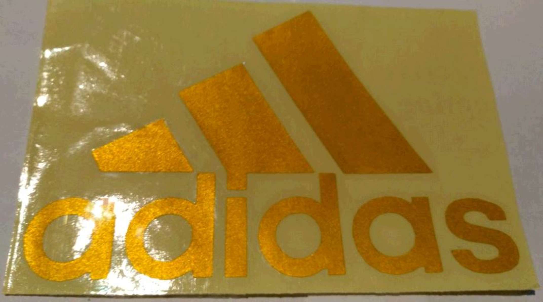 Наклейка логотип ADIDAS (14x9см, золото) (#0009)